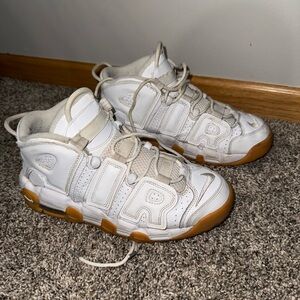 Men’s size 6.5 fits like women’s size 8 Nike Air more uptempo sneakers.
